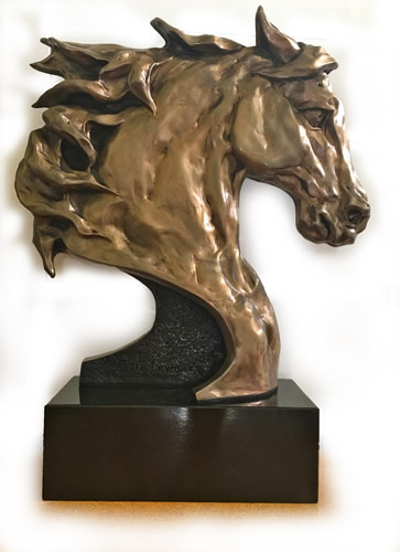 relief bronze sculpture of a horses head